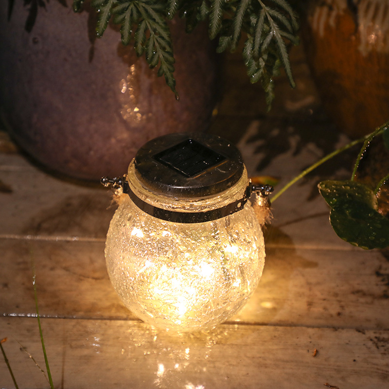 Solar LED Laterne im Glas – Dekorative Gartenbeleuchtung mit Drahtlichtern und Tragegriff