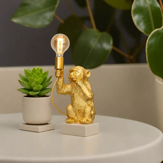 Elegante Goldene Affe Blumentop Lampe